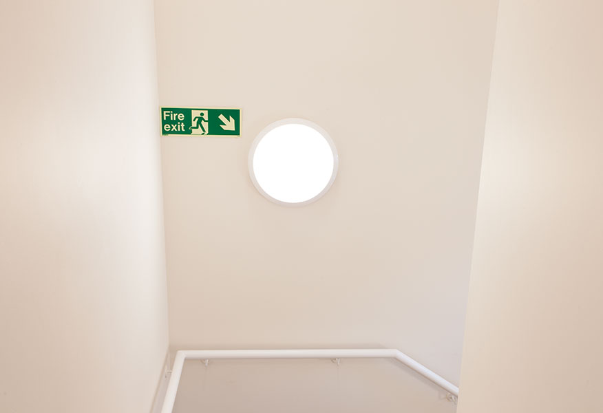 Tamlite Rosehall Care Home stairway emergency exit LED lighting