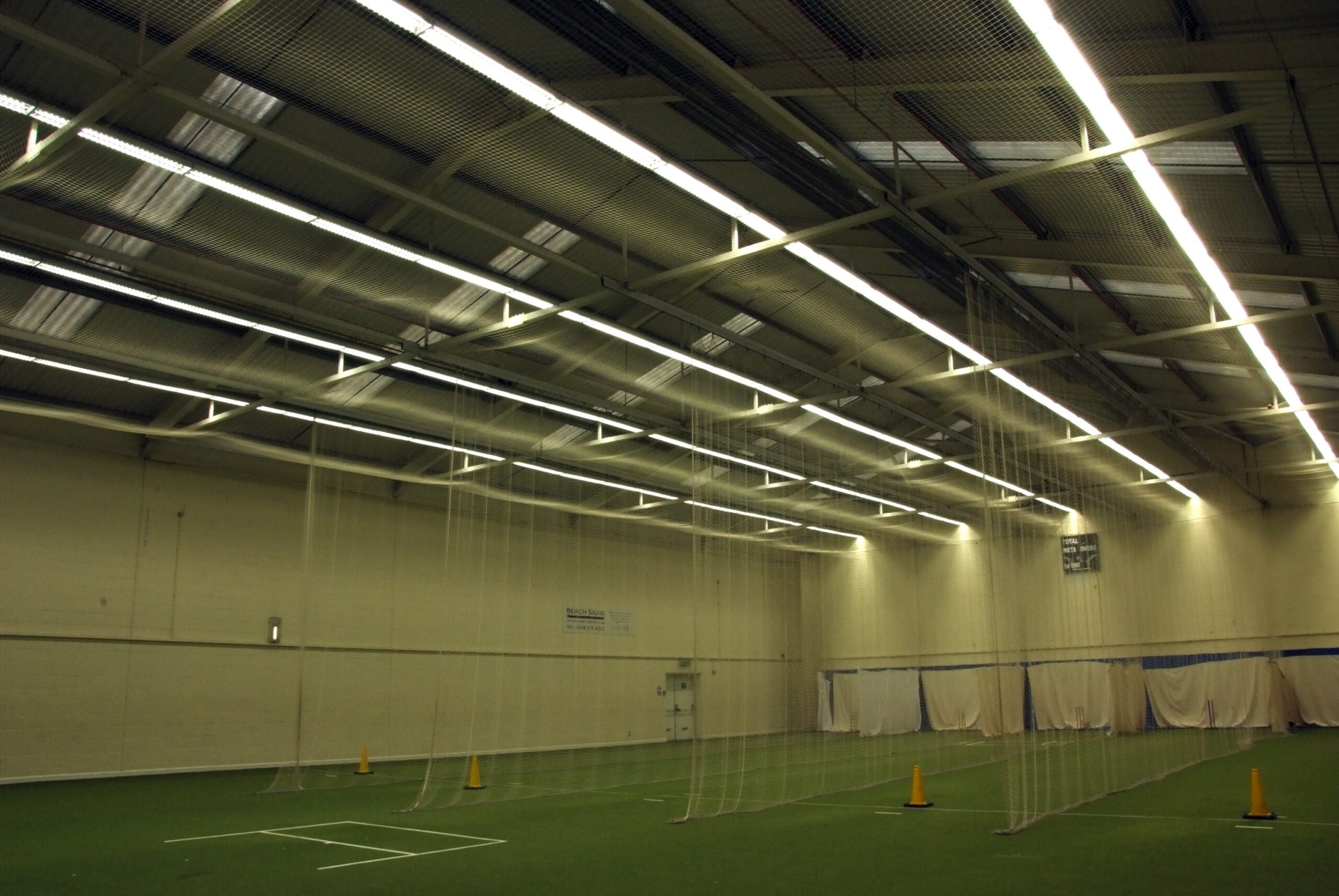 Tamlite Sheffield Hallam University sports hall lighting batting nets