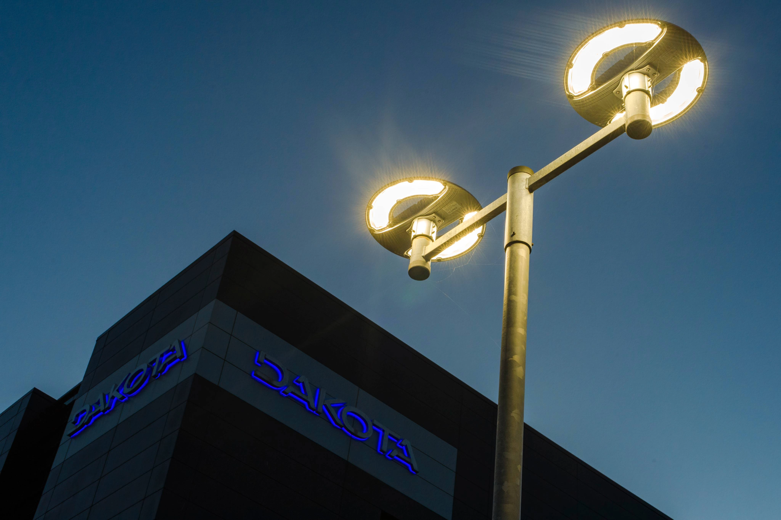Column lighting with Dakota building in background