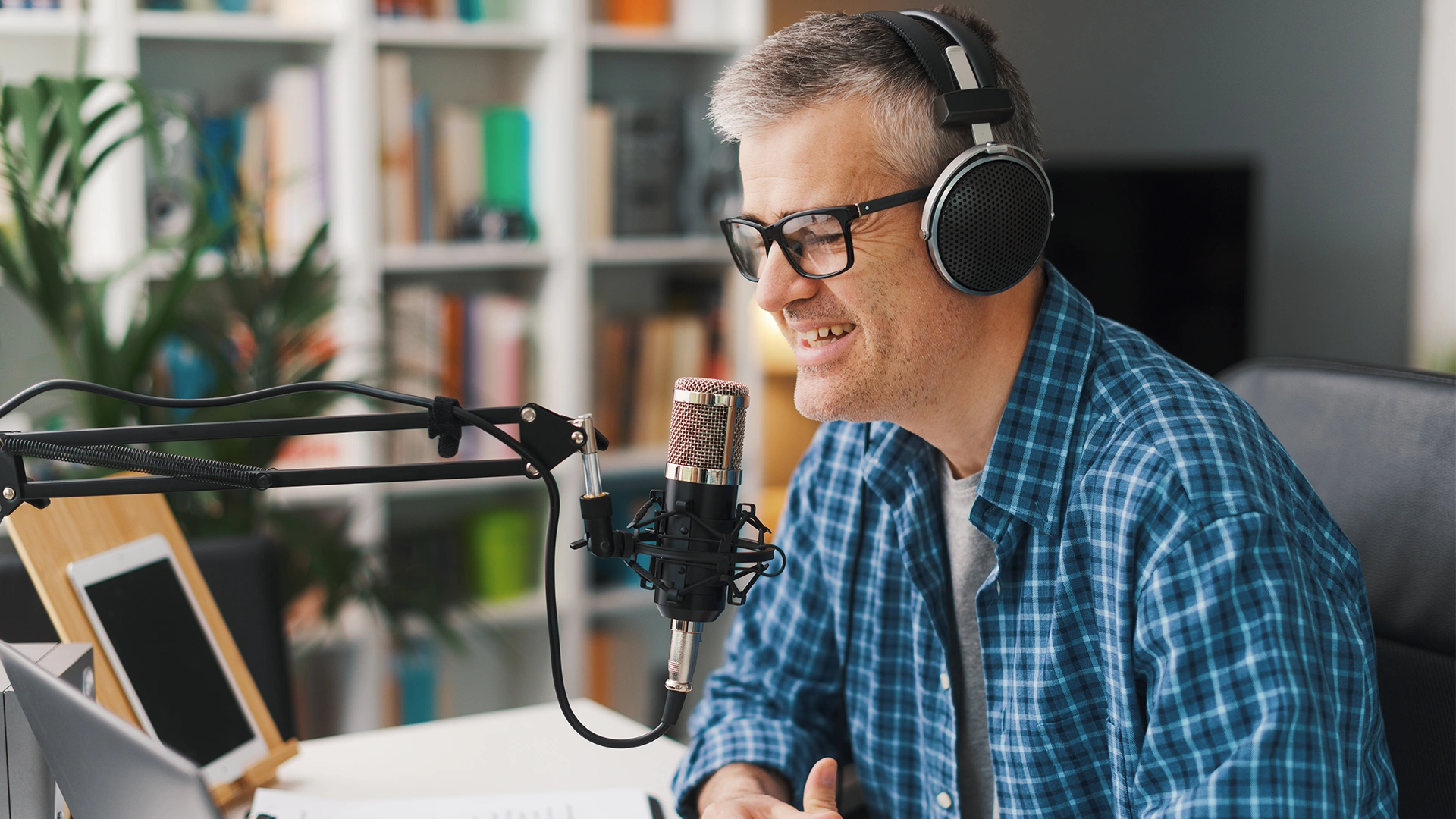 Tamlite T-Talk podcast showing a man talking into a microphone